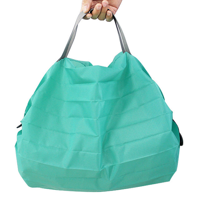 Foldable mini reusable grocery tote shopping bag in compact pouch form — view 8