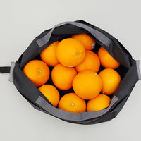 Foldable mini reusable grocery tote shopping bag in compact pouch form — view 2