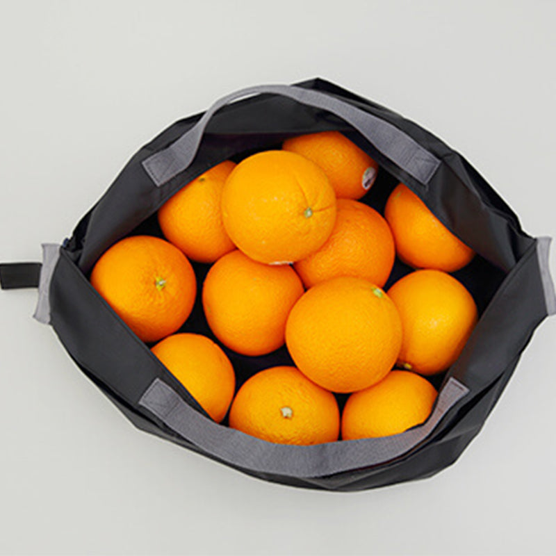 Foldable mini reusable grocery tote shopping bag in compact pouch form — view 2