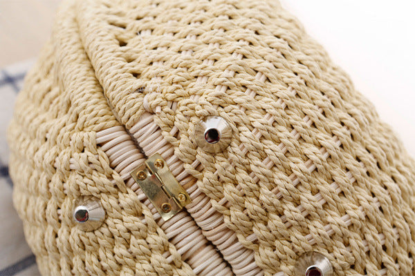 Hand-woven natural rattan handbag with leather handles — view 3