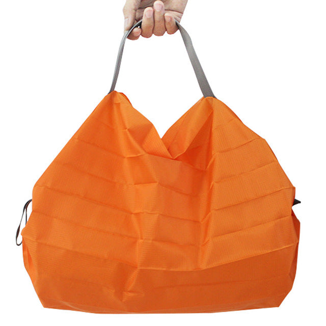 Foldable mini reusable grocery tote shopping bag in compact pouch form — view 11