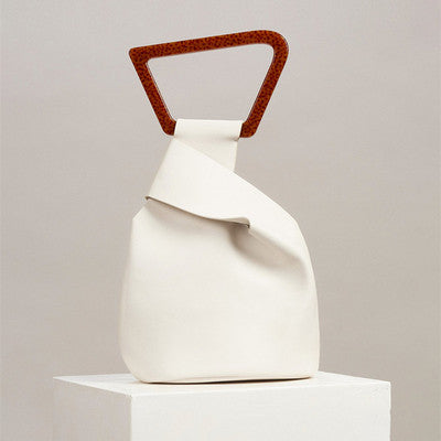 Structured metal handbag with polished silver finish