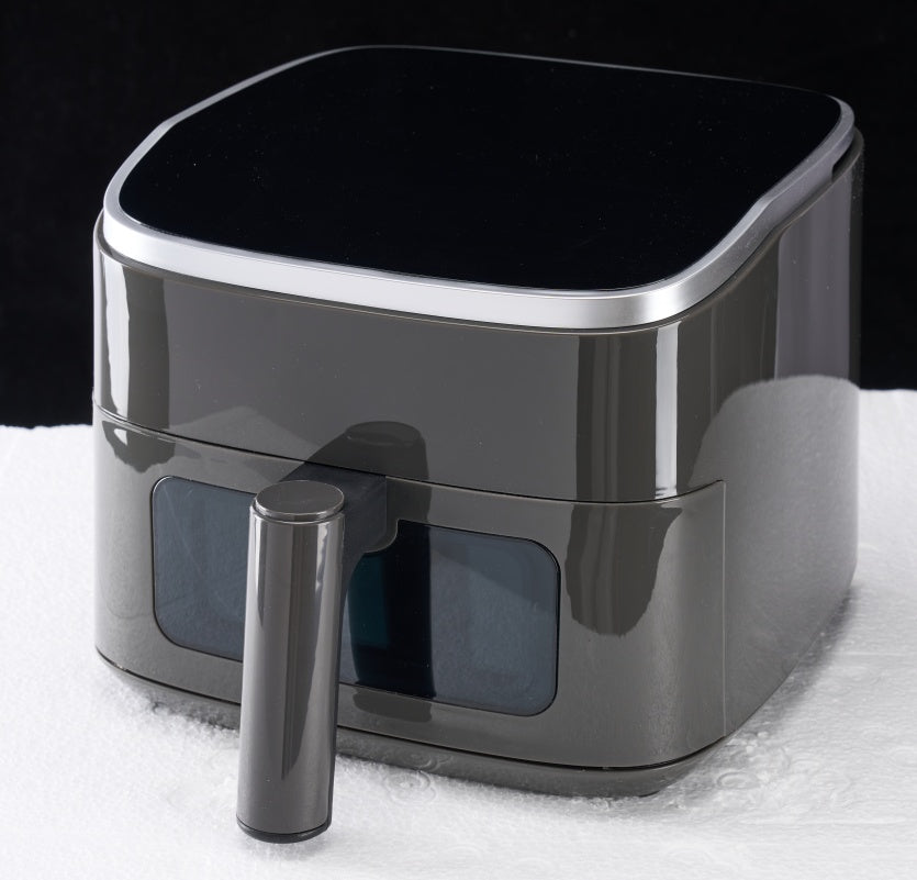 4-quart compact air fryer with digital controls on kitchen counter