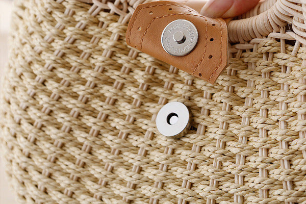 Hand-woven natural rattan handbag with leather handles — view 2