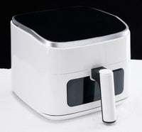 4-quart compact air fryer with digital controls on kitchen counter — view 4