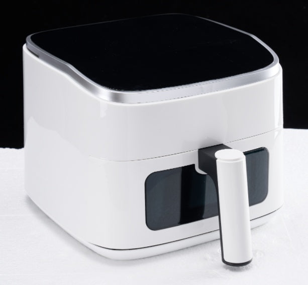 4-quart compact air fryer with digital controls on kitchen counter — view 4