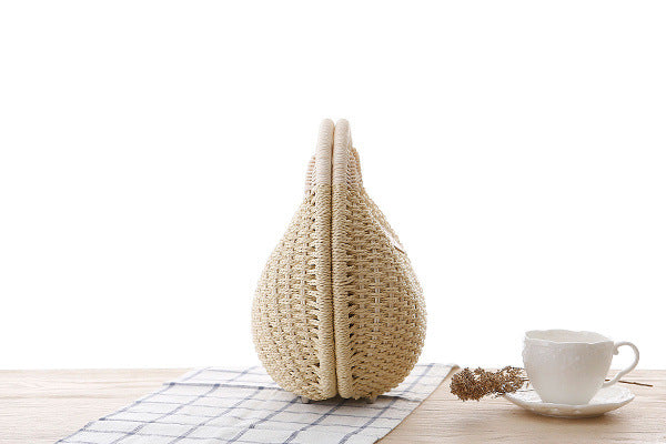 Hand-woven natural rattan handbag with leather handles — view 5