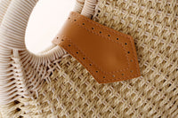 Hand-woven natural rattan handbag with leather handles — view 6