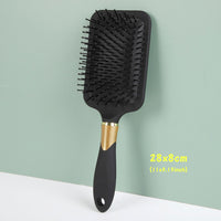 Cushion volumizing hair comb with detangling bristles