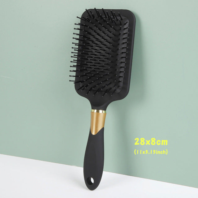 Cushion volumizing hair comb with detangling bristles