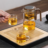 Borosilicate glass teapot with tea-water separation infuser on bamboo tray — view 2