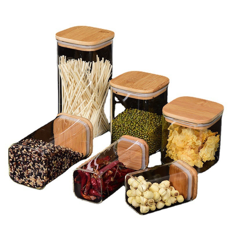 Sealed glass tea pot with bamboo lid storing loose leaf tea — view 5