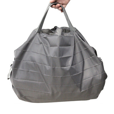 Foldable mini reusable grocery tote shopping bag in compact pouch form — view 9