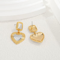 Light luxury fashion two tone earrings with a high-end feel, heart-shaped earrings with a heart shape, retro palace style peach heart earrings