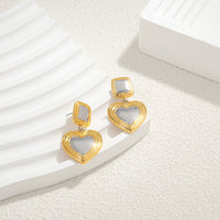 Light luxury fashion two tone earrings with a high-end feel, heart-shaped earrings with a heart shape, retro palace style peach heart earrings