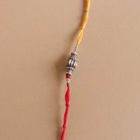 Sliver Ovol Beads Rakhi-1