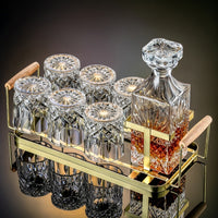 Premium crystal whiskey decanter set with two heavy-base whiskey glasses on wood tray