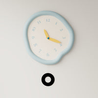 Asymmetrical Drip Clock